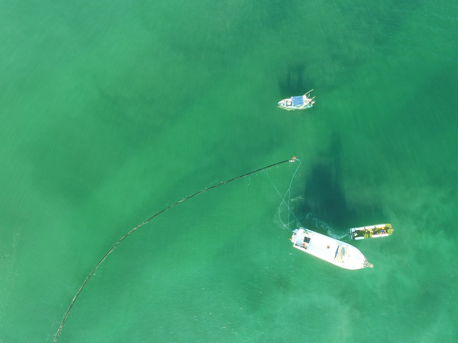 Aerial view of pipe handling with support boats